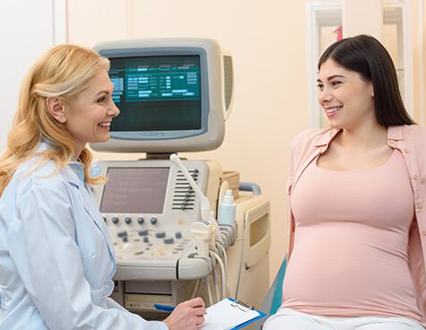 SMWC - female doctor consulting pregnant woman