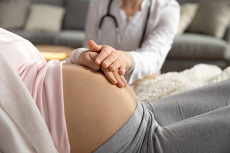 SMWC - female doctor support young pregnant women patient