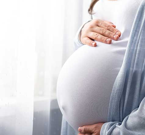SMWC - healthy pregnancy. Side view pregnant woman