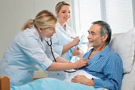 SMWC - Doctor examining a senior patient